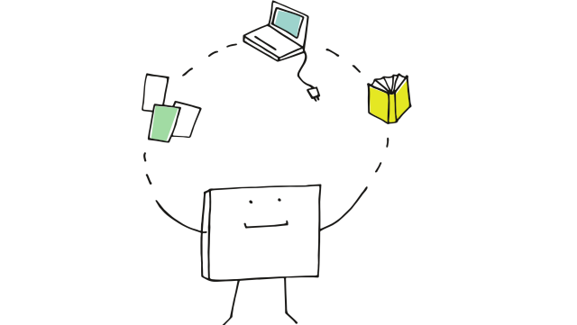 Ein Foto des PC-Pools. Su sehen sind ein mittlerer Tisch mit eingelassenen Monitoren sowie mehrere PC-Arbeitsplätze an der Seite.