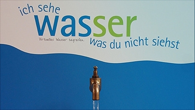 Schriftzug Ich sehe Wasser mit Wasserhahn darunter