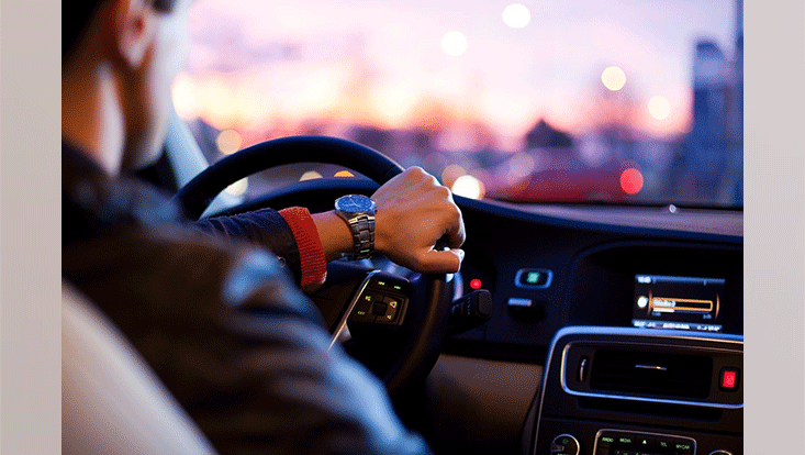 cockpit of a car, man driving