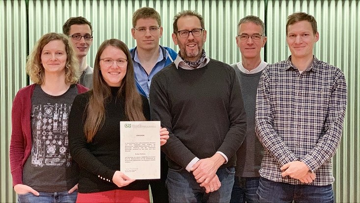 Evelyn Herberg receives a Certificate of Recognition