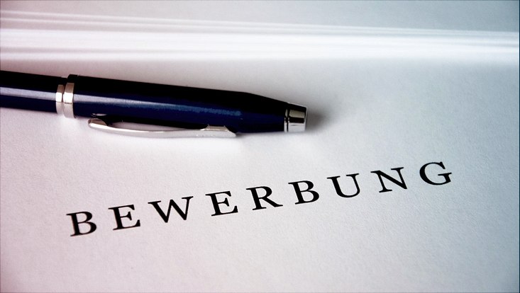 Zettel, Kugelschreiber, Schriftzug"Bewerbung"