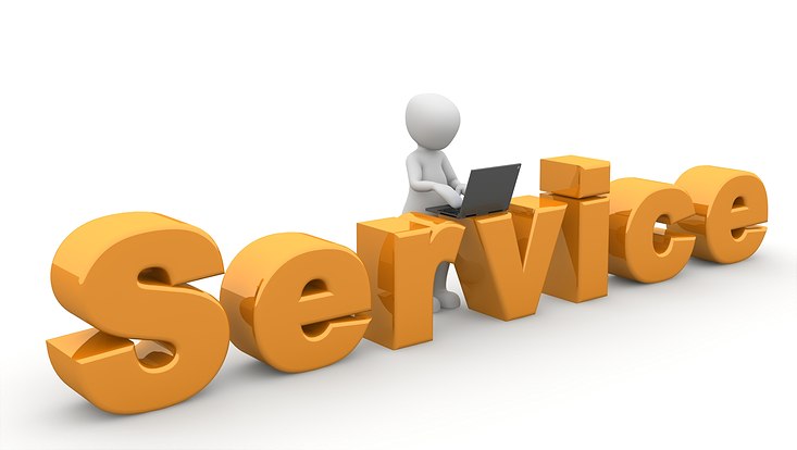 gelbe Buchstaben "Service" graues Männchen mit Notebook