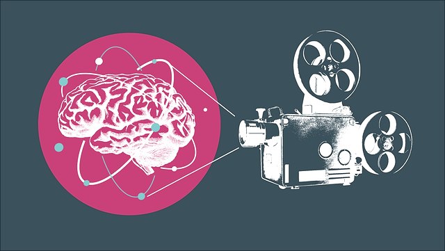 Zeichnung einer alten Videokamera, die ein Gehinrn filmt