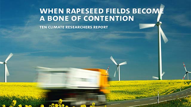 booklet-11-640-361 A yellow canola field with a truck in the foreground