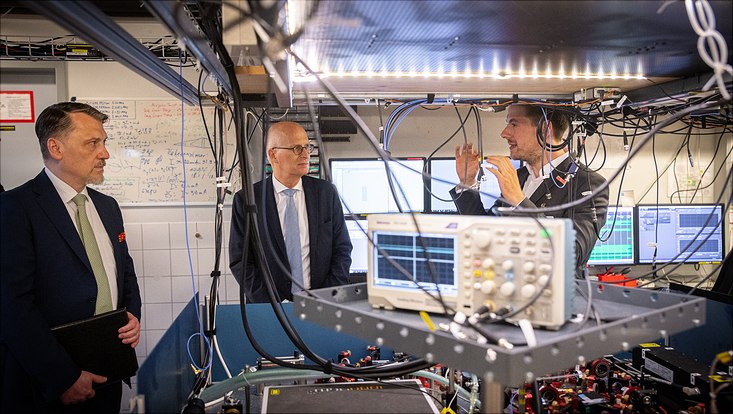 Three persons in a lab