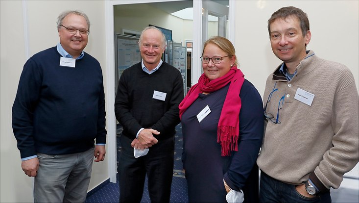 gruppenbild-733x414 Three men and a woman