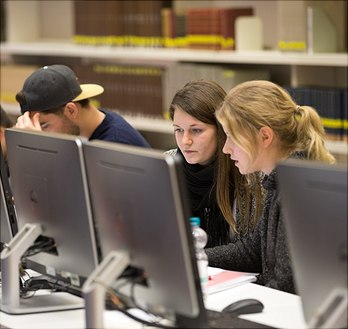 slider3 students sitting before computers
