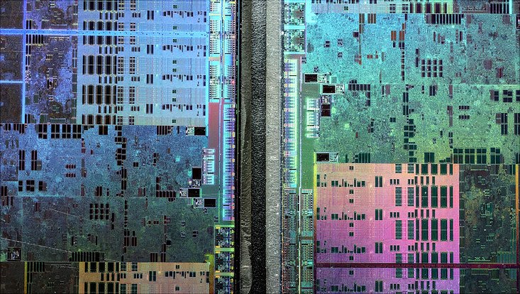 Abstract microscopic photography of a Graphics Processing Unit resembling a satellite image of a big city