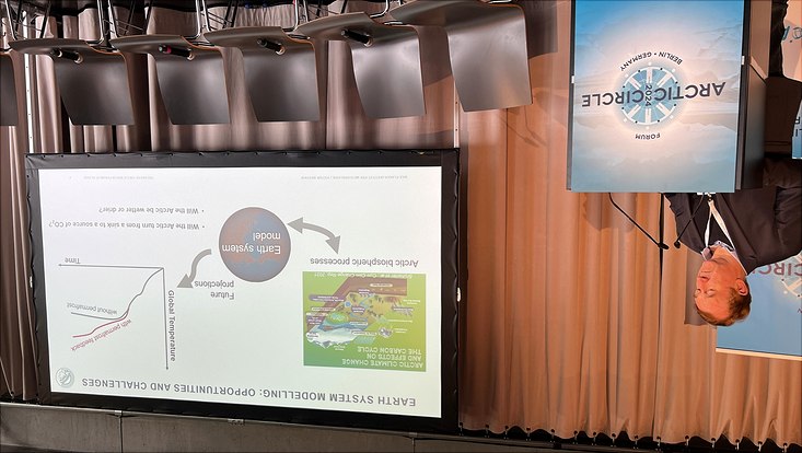 scientist presenting needs for improving permafrost feedback into Earth System models at Arctic Circle Berlin Forum