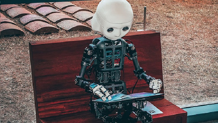 A robot reading a magazine