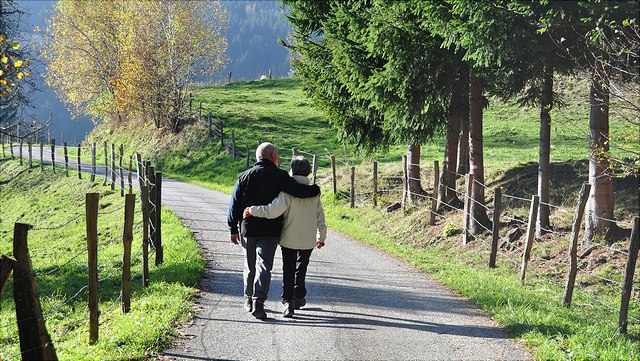 Senior couple taking a walk in the countryside