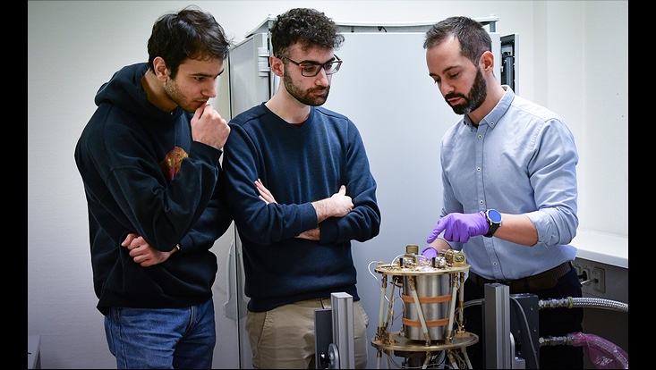 wisplc-733x414 image of dark matter experiment WISPLC with three researchers