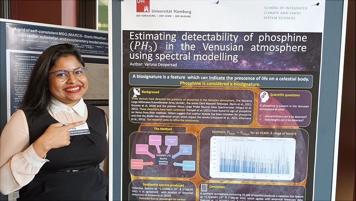 Varuna Deopersad showing her poster about possible life on Venus