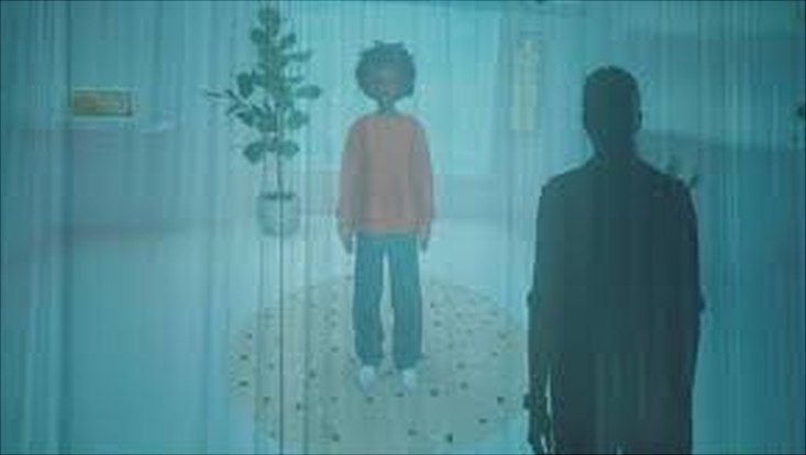 film still from "tttt" showing a chat bot impersonated as a virtual human and a reallife person separated through a curtain.