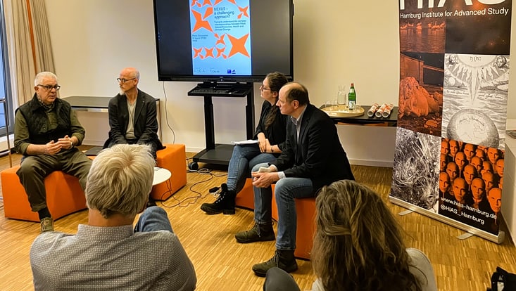 four experts in front of the audience