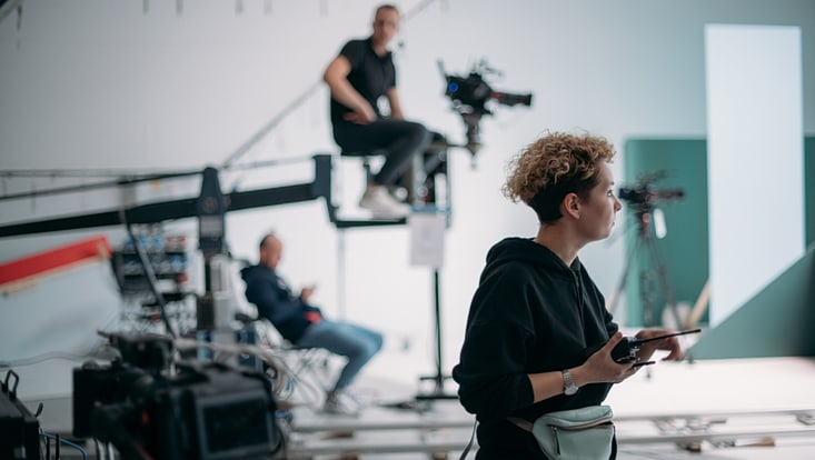 Director at work on the set. The director works with a group while filming.