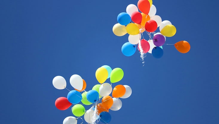 colourful ballons in a blue sky