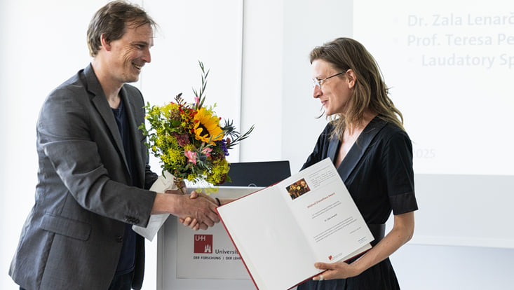 The speaker congratulates the awardee