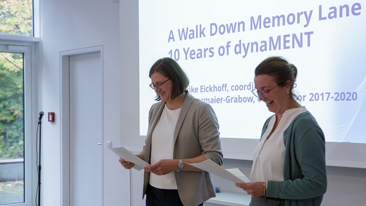 co-2330-733x414 Two women give a speech, smiling.