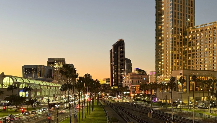 Outside photo of the San Diego convention center at dusk.