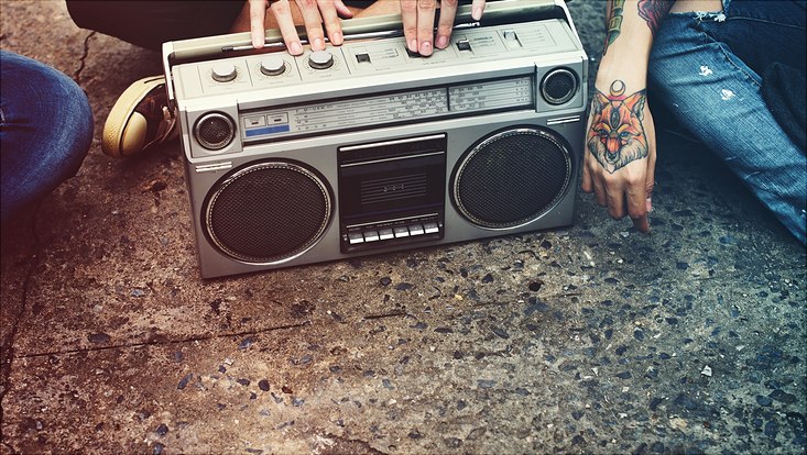 People listening to a radio broadcast