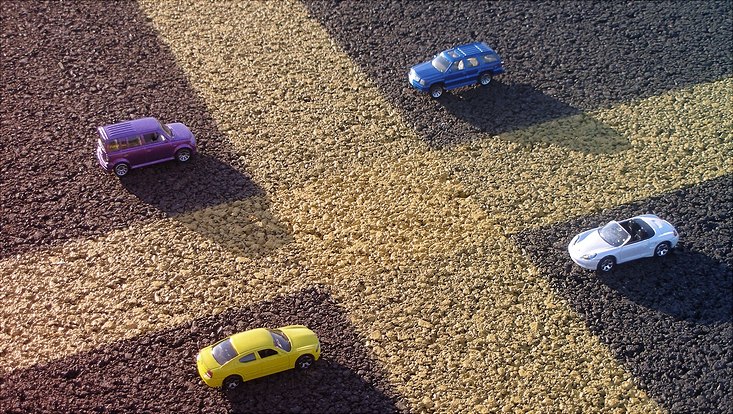 Vier Spielzeugautos