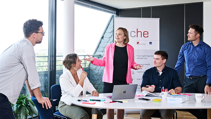 Group of researchers discussing
