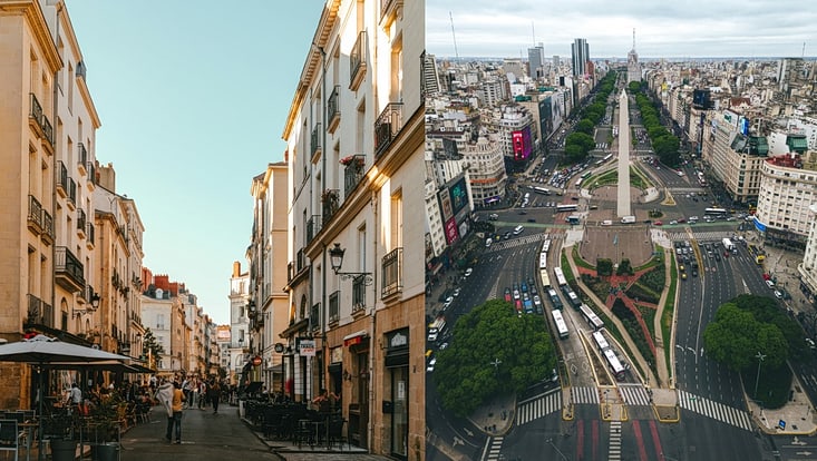belebte Straße in Altstadt links, Blick auf Großstadt von oben rechts