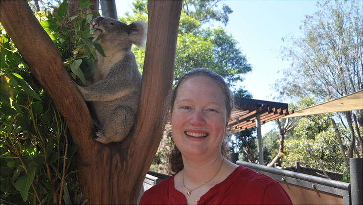 Kirstin Hammann female student posing with a koala