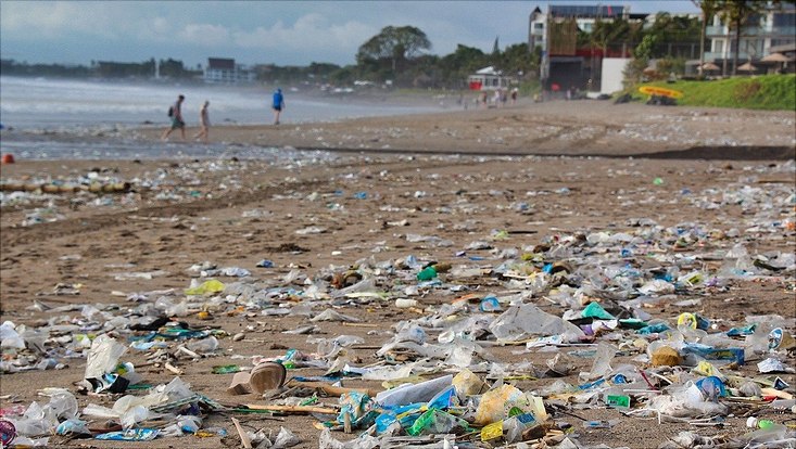 Plastic waste on a beach in a tourist area