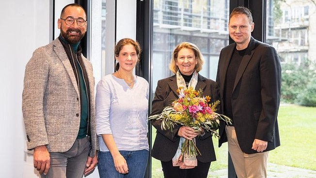 Congratulating Prof. Dr. Beate Ratter (second from the right): MIN Dean Prof. Dr. Norbert Ritter, CLICCS Spokesperson Prof. Dr. Johanna Baehr, and University President Prof. Dr. Hauke Heekeren.