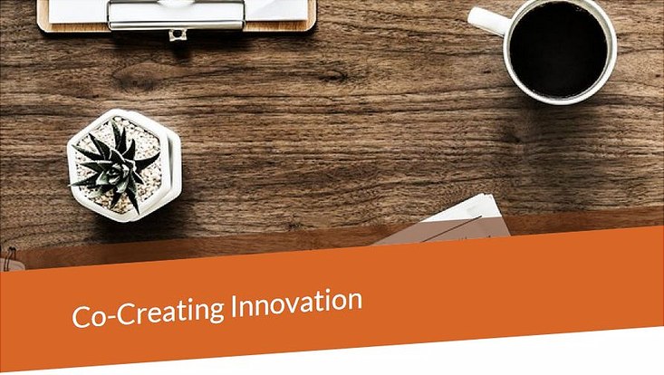 Titelbild Co-Creating Innovation von EUGLOH mit Kaffeetasse und Pflanze