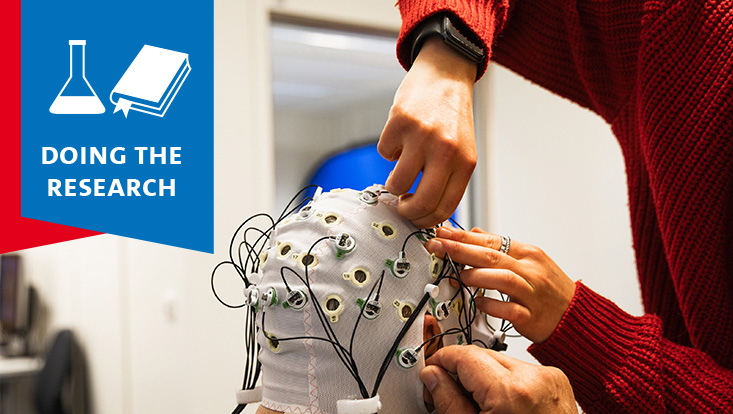 A test subject wearing an EEG cap
