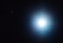 Exoplanet and parent star (pale spots on black background)