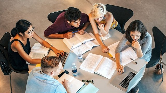 Group of researchers at a table
