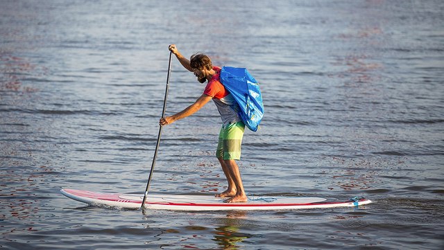 A man on a SUP board