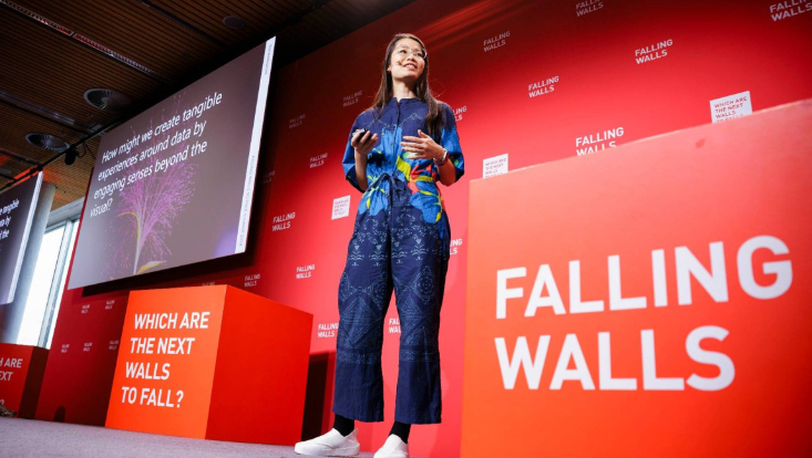 Woman on a Falling Walls branded stage