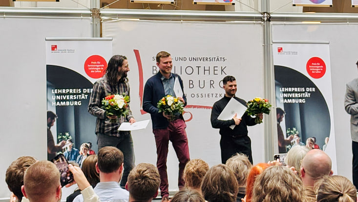 Preisannahme: Lukas Musumeci, Anton Sefkow und Marten Borchers