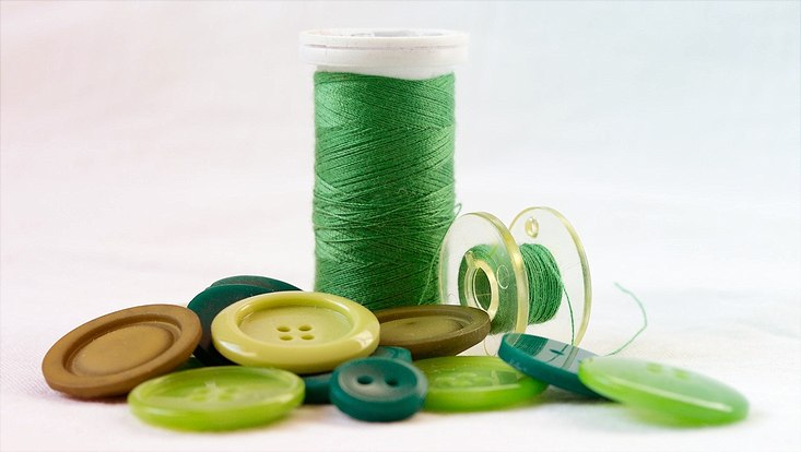 Nähzubehör in grüner Farbe